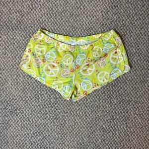 Cute vintage y2k-style soffe low rise green peace sign mini/ micro shorts
